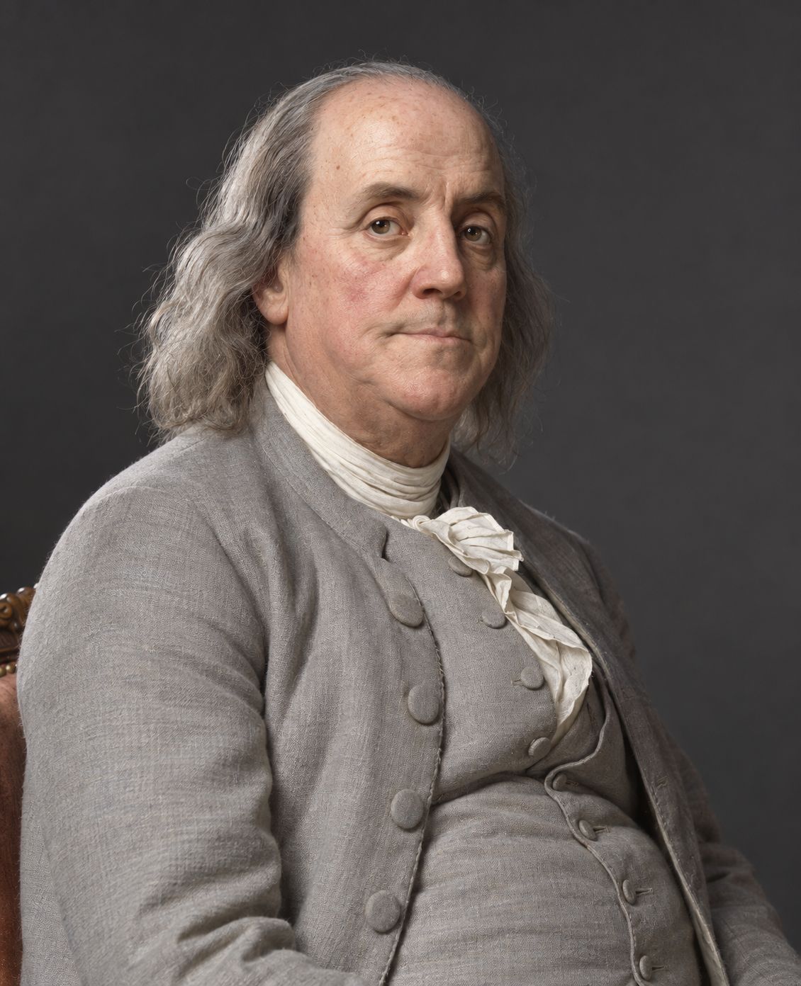 An elderly Benjamin Franklin in a plain coat, painted by Joseph Siffred Duplessis.